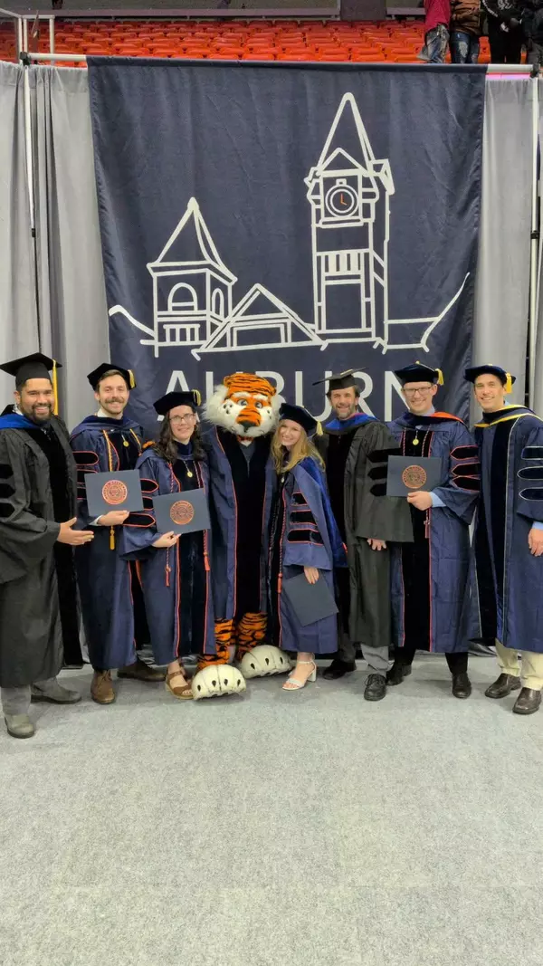 Dr. Gross and the rest of the Biology doctoral graduates at commencement