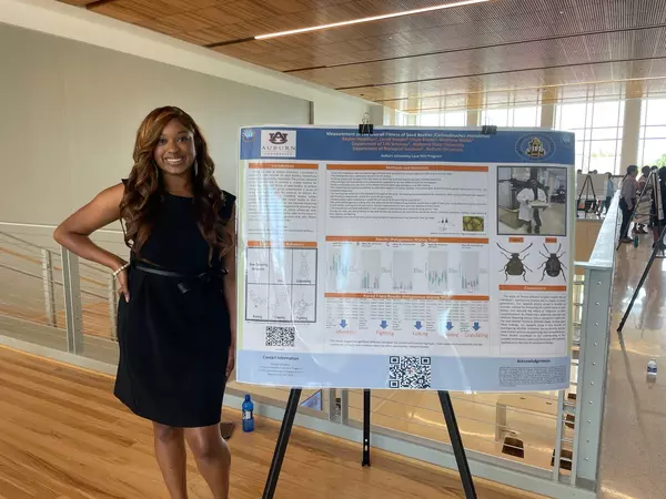 Kaylen Hamilton and research poster