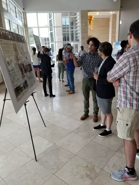 Jorge presents his poster
