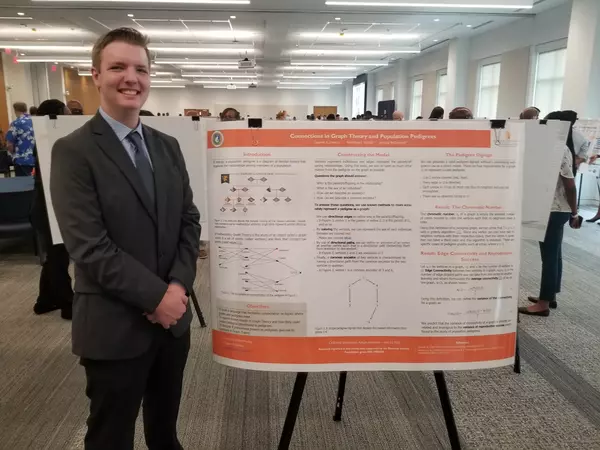 Clayton Jowers and research poster
